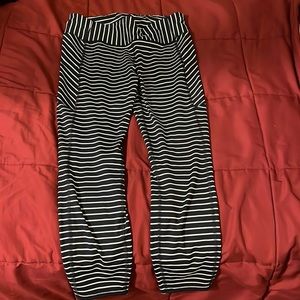 Athleta tights. Navy blue w/ white stripes. Size L.
